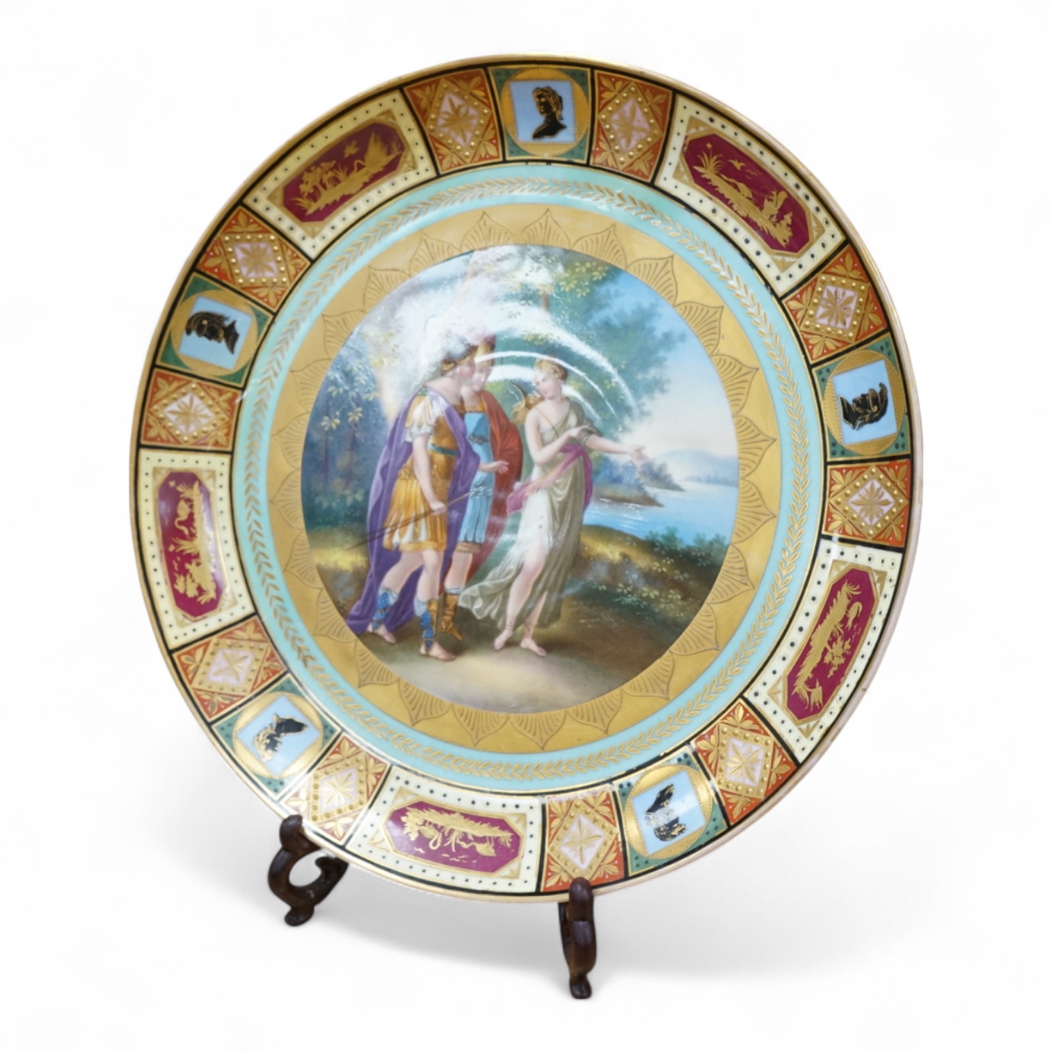 A Vienna style cabinet dish, c.1900, with central cartouche of Ulysses, Achilles and Thetis. 30cm diameter.